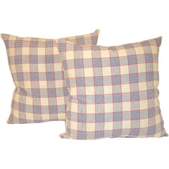 19TH C. LINEN PLAID PILLOWS IN  RED, WHITE, AND BLUE.