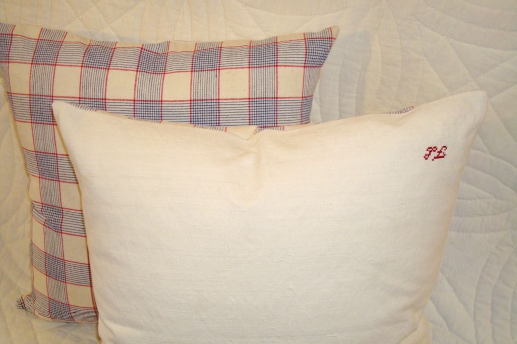 American 19TH C. LINEN PLAID PILLOWS IN  RED, WHITE, AND BLUE.