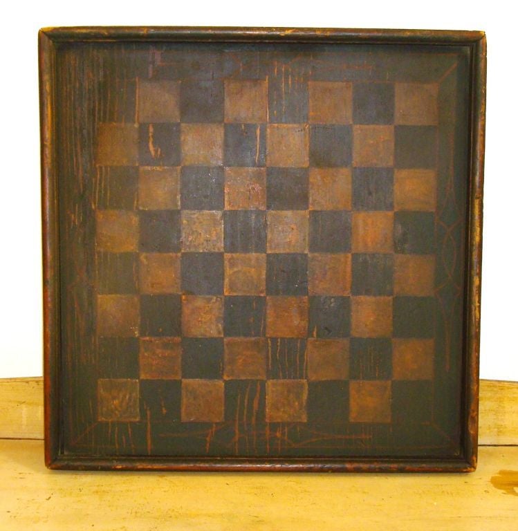 ORIGINAL PAINTED CHECKERBOARD GAMEBOARD IN GREEN AND SALMOM WITH A VERY DARK PATINA. ORIGINAL SQUARE NAIL CONSTUCTION.