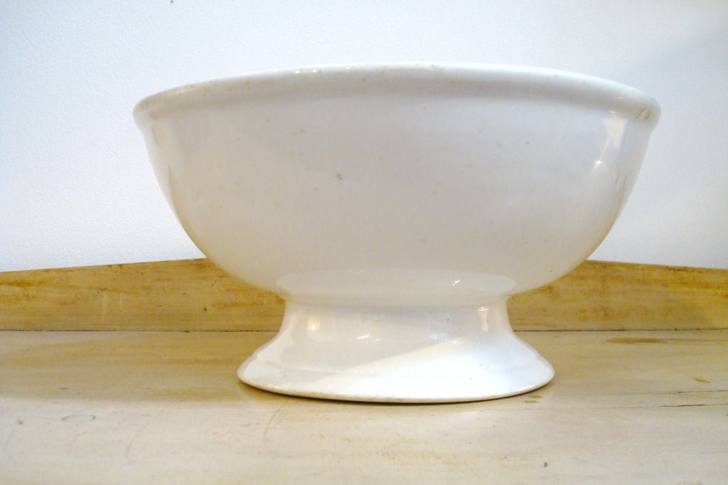FANTASTIC 19THC IRONSTONE PUNCH BOWL FROM ENGLAND. THIS PEDESTAL BOWL IS GREAT FOR FRUIT OR SERVING FOOD BECAUSE OF ITS OVERSIZE SCALE. A WONDERFUL ADDITION TO A COLLECTION OF IRONSTONE.
