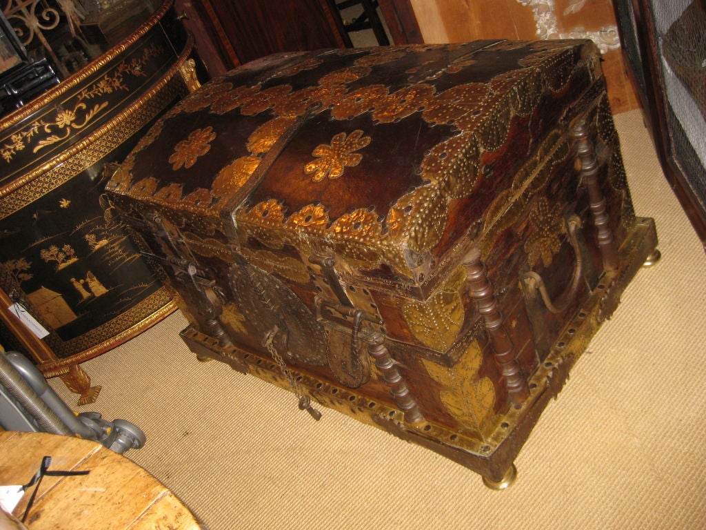 Amazing leather and brass covered wood trunk with hand forged iron hardware and three early primitive iron locks