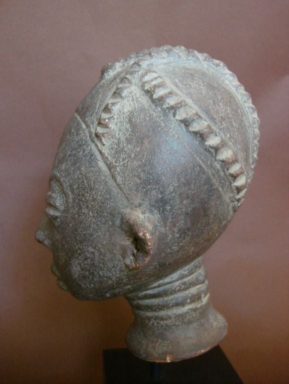 The Akan speaking women of Ghana made these fine terracotta sculptures as funerary heads to honor royalty and important women and men. Varying widely in size and style, these sculptures combined individualized features with idealized traits,