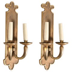 A pair whimsical bronze French 40's sconces