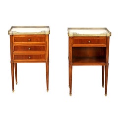 An exquisite pair Louis XVI-style marble-top side tables