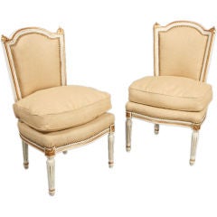 A pair Louis XVI style boudoir chairs on tapered legs