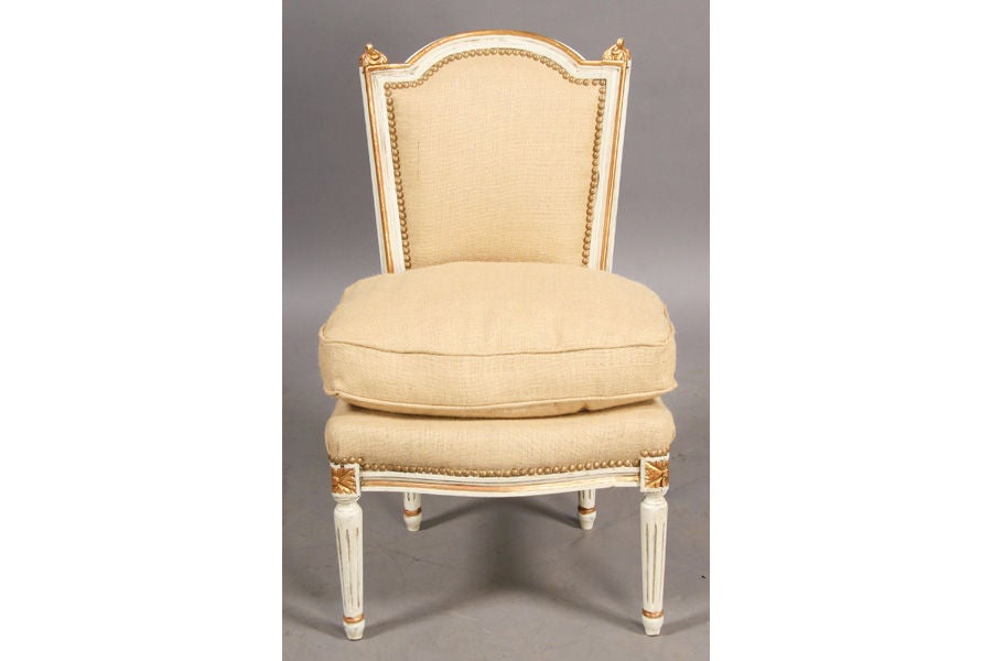A pair Louis XVI style boudoir chairs on tapered legs