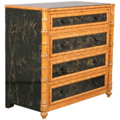 An exceptional faux-bamboo and reverse-painted mirrored chest