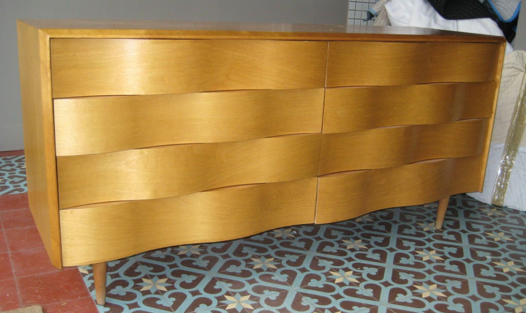 Striking undulating drawers in blond birch and curly maple veneers by obscure American designer Edmond Spence, in a Swedish idiom and manufacturer. Wonderful original finish.