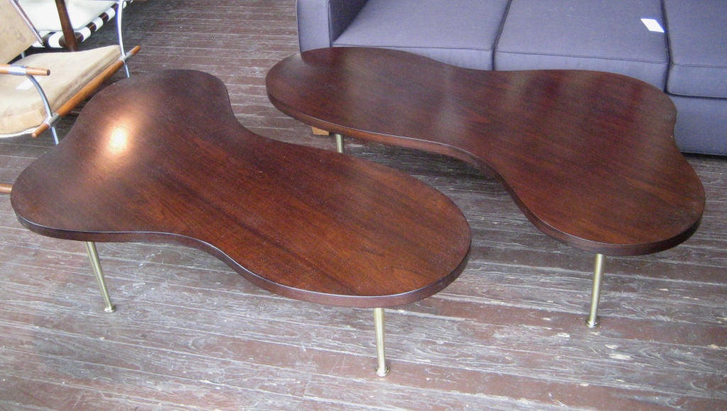 Wonderful biomorphic design on three tapered solid brass legs. These are the smaller 54