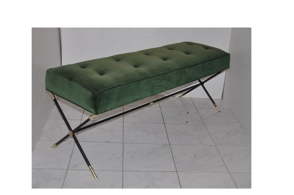 Bench in green upholstered velvet, black enameled iron and brass.