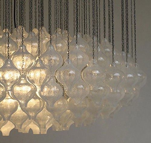 Rare and custom ordered monumnetal Chandelier from the theatre in Germany by Kalmar with handblown crystal bulbs, c.1960's, Austria. Handblown crystal bulbs are suspended with chains from the circular white laminate disc.  Design by Julius August