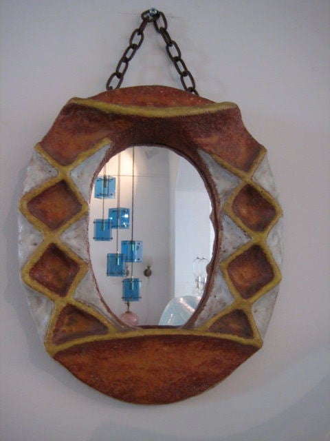 A wonderful ceramic mirror by Isabelle Ferlay (b. 1917-), titled 