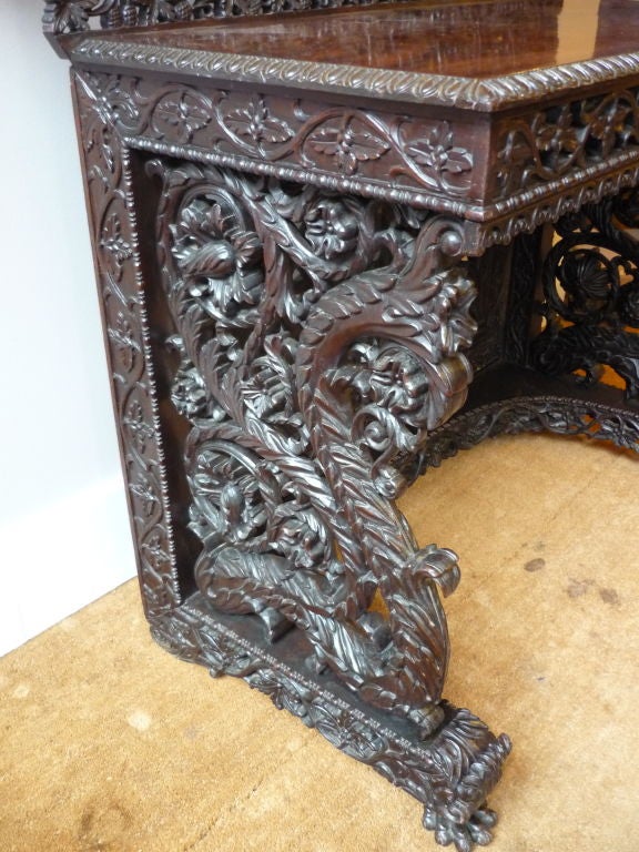 Best quality Anglo Indian solid rosewood console table with intricate carving throughout.
