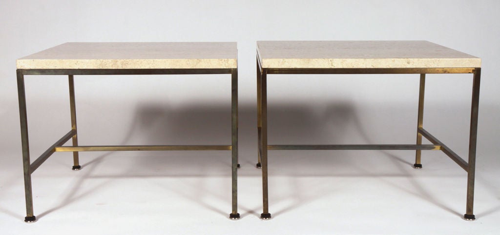 A pair of square occasional tables with beautiful travertine tops resting on brass square tube frames, model no. 8732. By Paul McCobb for Calvin Furniture. U.S.A., circa 1950.