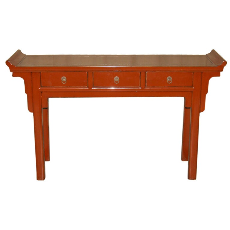 Table console en laque rouge raffinée à trois tiroirs