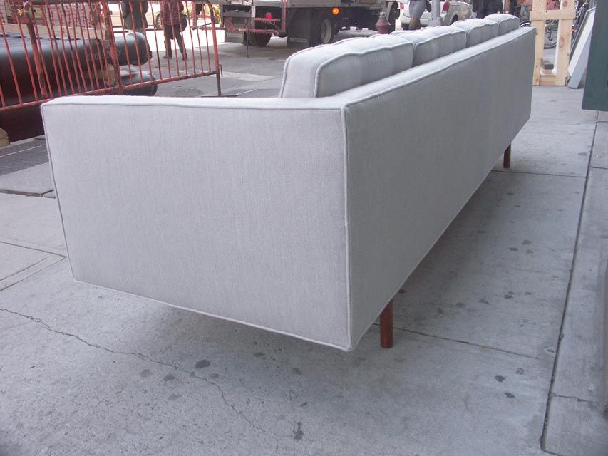 Walnut A Sophisticated Four seat Sofa by Milo Baughman