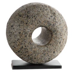 antique granite mill stone on custom made steel base