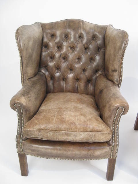 pair leather armchairs