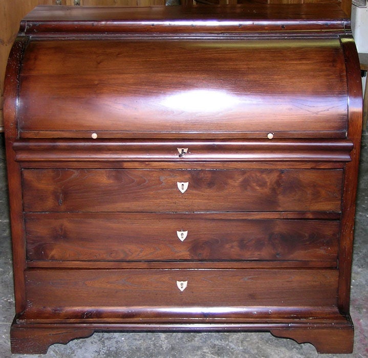 Elmwood desk with beautiful patina. Has many compartments and drawers. Behind the 3 large drawers there is an inscription that reads Norskov (Denmark) December 23, 1844 Karl Emil Jensen. Jensen may be the creator, or he just gave this as a Christmas