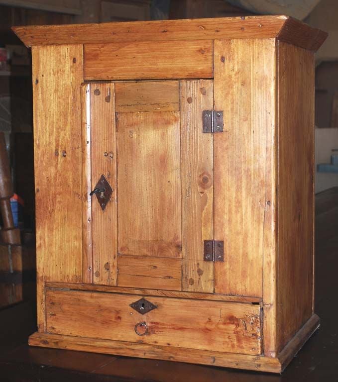 Charming wall cabinet with sturdy dovetail construction and plenty of character. Can also function as nightstand or end table. Working lock and key!
