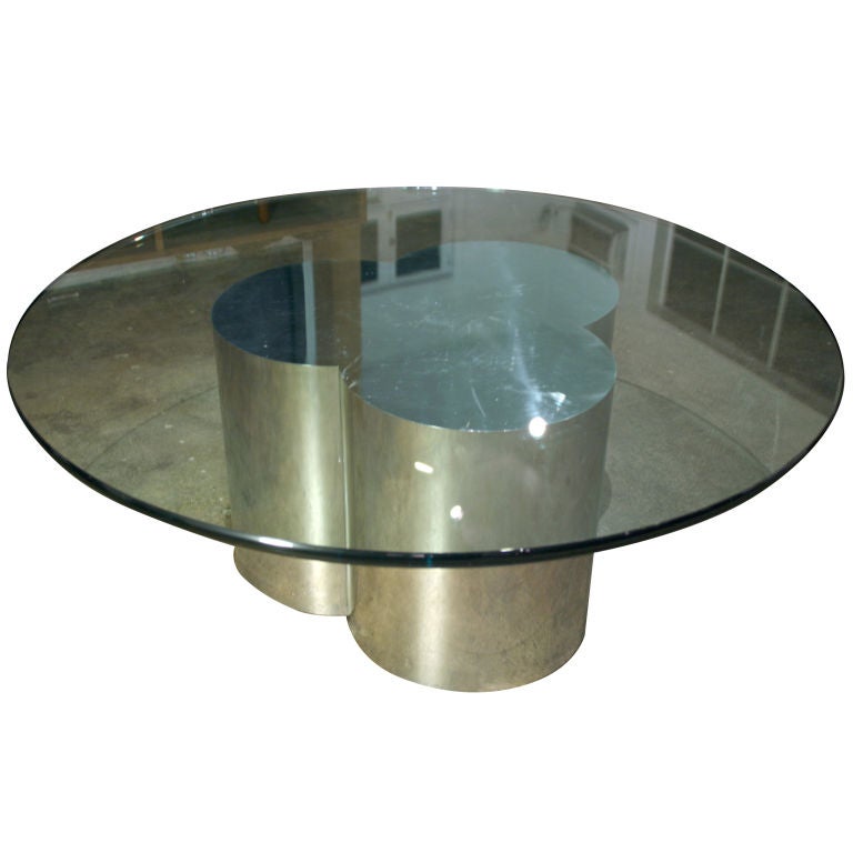 A Curtis Jere chrome cloverleaf and glass top coffee table