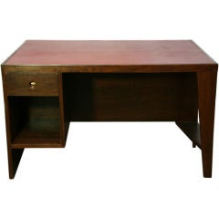 A rosewood and leather desk by Pierre Jeanneret for Chandigarh