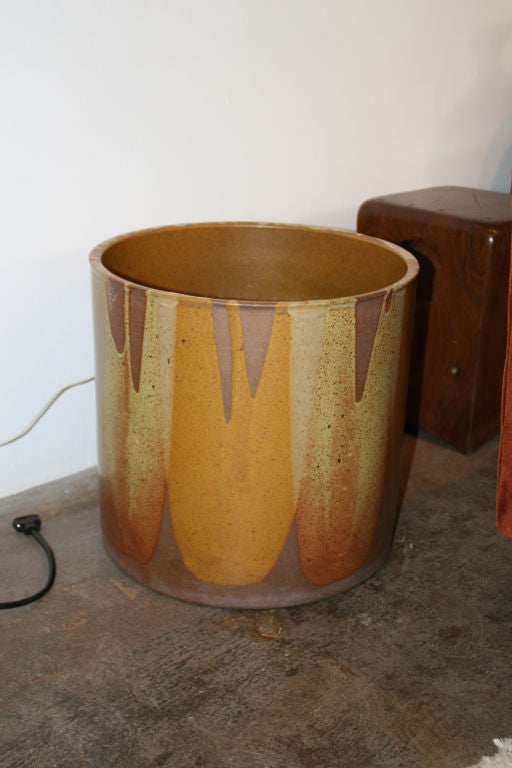 A drip glaze stoneware planter by David Cressey
