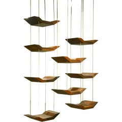 Adjustable hanging shelves by Zanini de Zanine