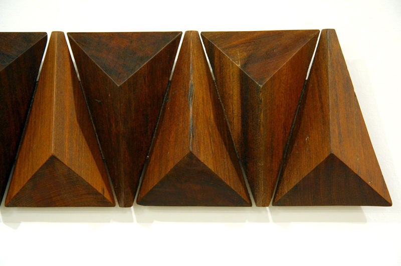 This set of sculpture is a unique work that is made from solid reclaimed ipe. All the wall sculptures made by Zanini are fashioned from scraps that he carefully relieves from his furniture designs in order to preserve the consistent forms.