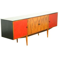 Red and black leather covered credenza with rosewood doors