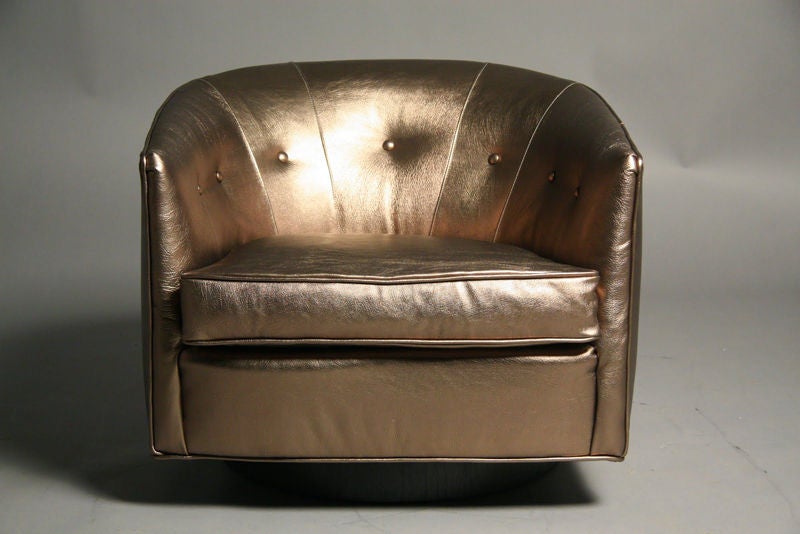 American Pair of bronze leather swivel tub chairs by Milo Baughman