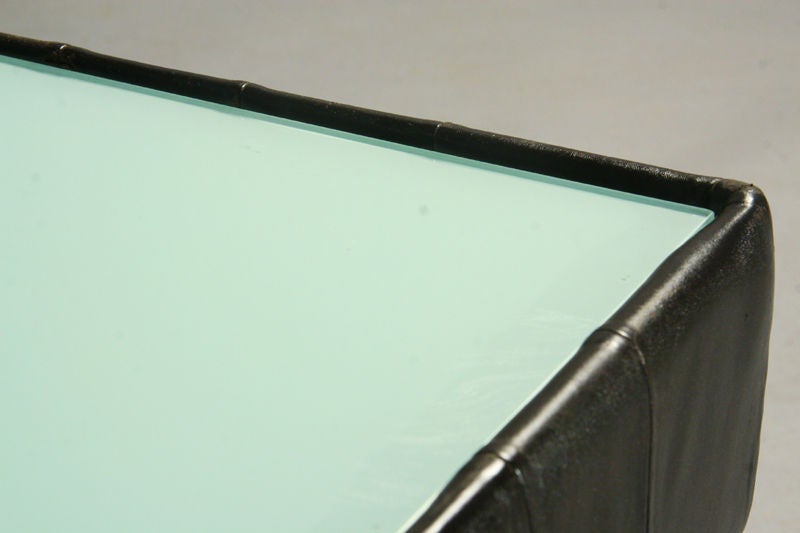 Pair of quilted chocolate leather end tables from Brasil