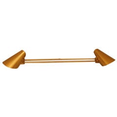 Single two light articulating sconce.