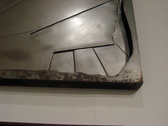 SCULPTED STEEL ON WOOD