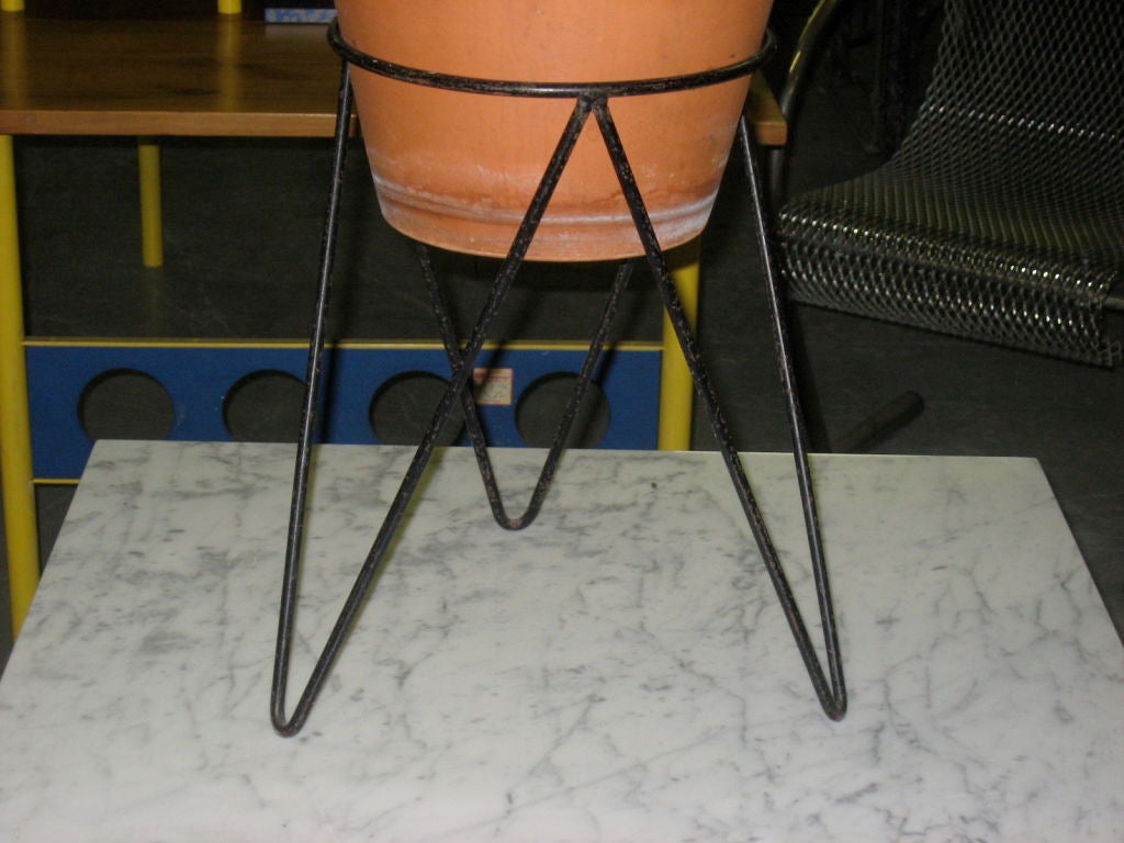 ENAMELED wrought iron PLANT STAND DESIGNED BY JEAN ROYERE