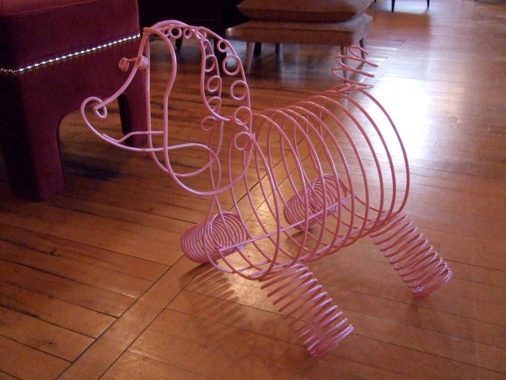 EWhimsical Frederick Weinberg magzine rack. Iconic Poodle form.

This is a one of a kind piece and can be used as a sculpture as a file holder or rack for your favorite LP's. Made of twisted wire, springs and newly powder coated.

Please visit