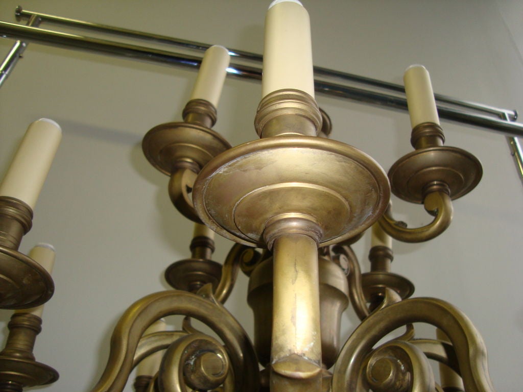 A Brass Twelve Light Chandelier  5