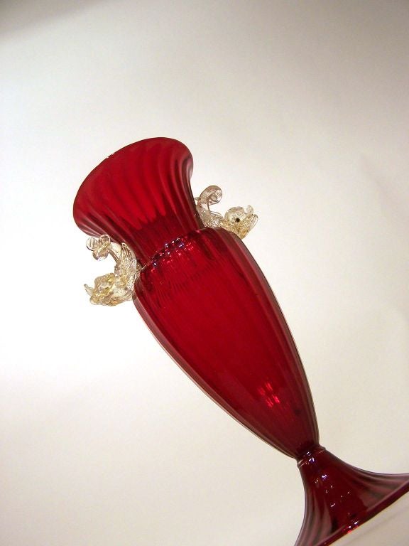 Sophisticated Venetian vase by Salviati with applied fish, deep red with dolphins in clear & gold, Murano, Italy. ***Notes: There is no sales tax on this item if it is being shipped out of the state of Florida (Objects In The Loft will need a copy