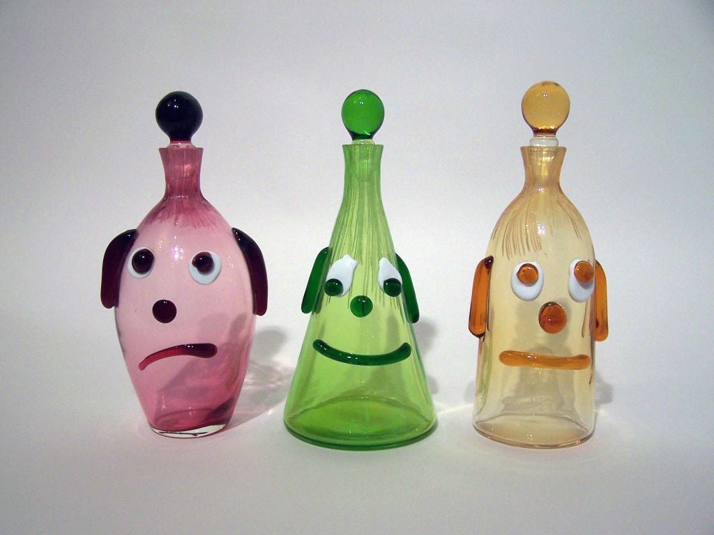 Fine set of 3 decanters by Fratelli Toso, Murano, Italy.  Priced for the set of 3.  Green: 11
