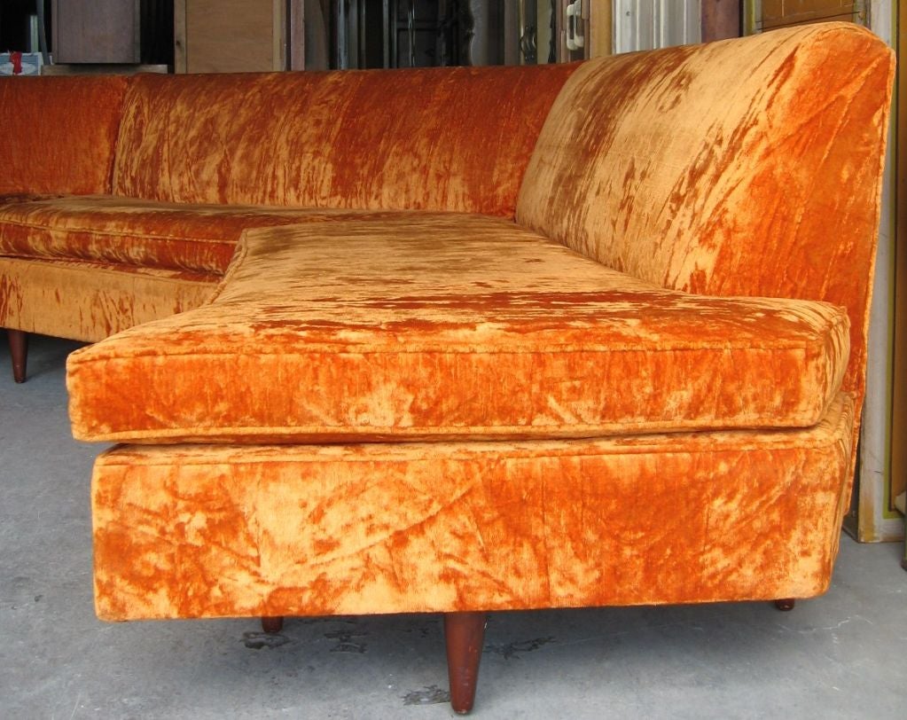 Elegant lines on this three piece sectional sofa, possibly by Modernage, dating to the late 1950's. Heavy and well made, this sofa is completely symmetrical, basically a gentle 