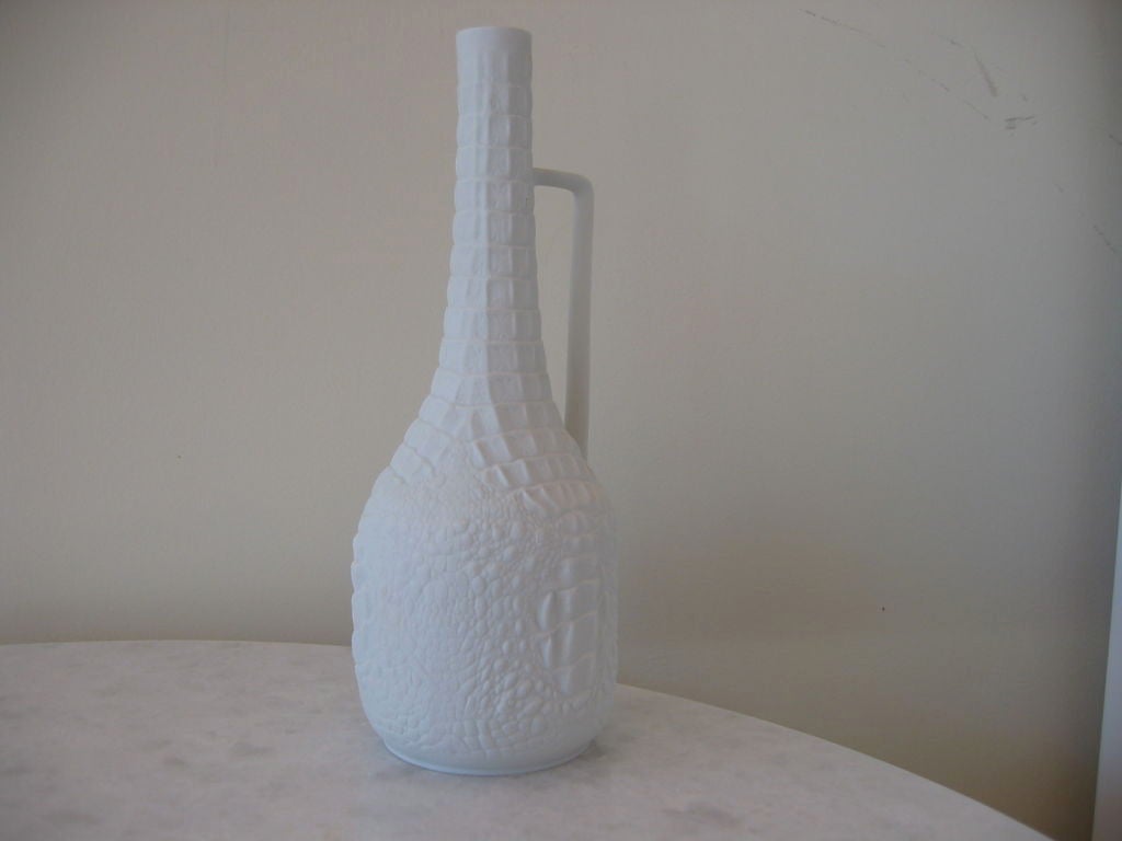 Rarely seen crocodile embossed porcelain jug vase with bisque finish. Very attractive and elegant. Great by itself or with a grouping.