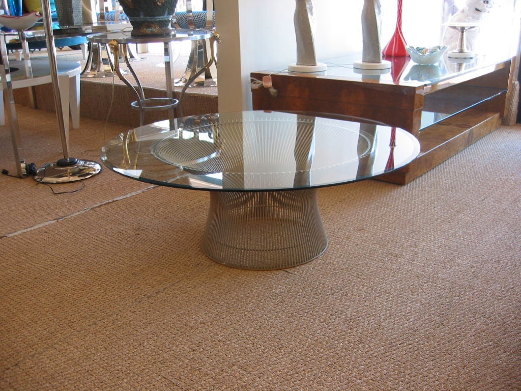 Round flared top Platner table for Knoll. Original plastic / rubber bumper attached to base to protect floor.