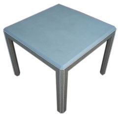 A Leather Clad Parsons/Game Table in Stud Trim