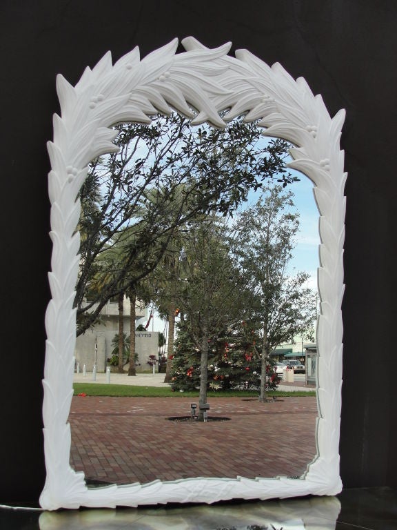 Hollywood regency palm style decorative trim, eglomise mirror tops and trim on consoles. Dimensions for Mirrors are:  Height = 47.5 inches, Width = 30.5 inches, Depth = 2.25 inches<br />
<br />
These items are being sold as a set (ONE CONSOLE AND