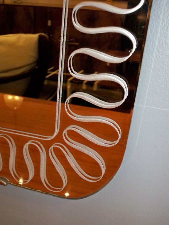 A Frameless Etched Wall Mirror