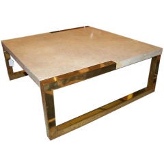 A Square Modernist Cocktail Table in Brass and Travertine