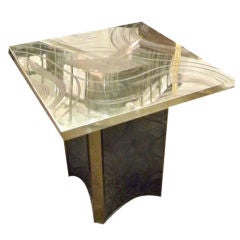 A Tall Brass Topped Side Table