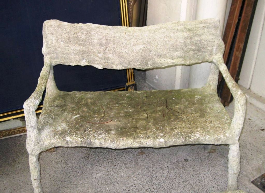 A classic faux bois bench with a matching coffee table.<br />
Its very rare to find a matching set like this. Note the moss and spores covering both items giving them that great weathered look. The bench measures 40L x 20D x 34back ht, 18 seat ht. 