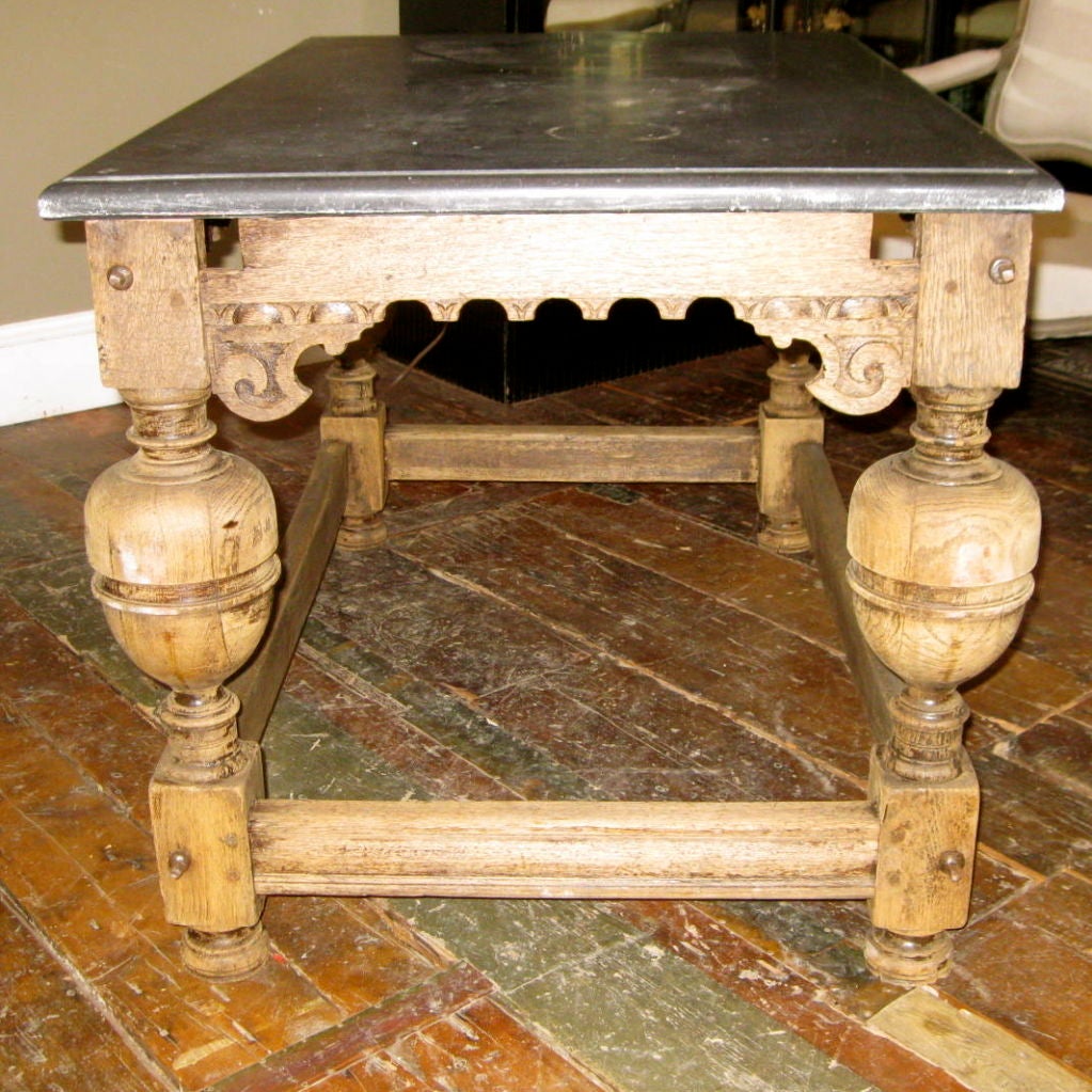 This table dates from the late 18thC to early 19thC. Its was a payment table that was used by government officials when residents payed taxes due. It is all hand done.<br />
The bluestone was added at a later date.