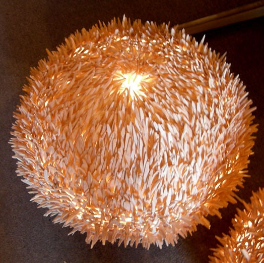 These might be the most unique lamps we have yet to encounter! They are constructed of literally thousands of hand carved wooden 